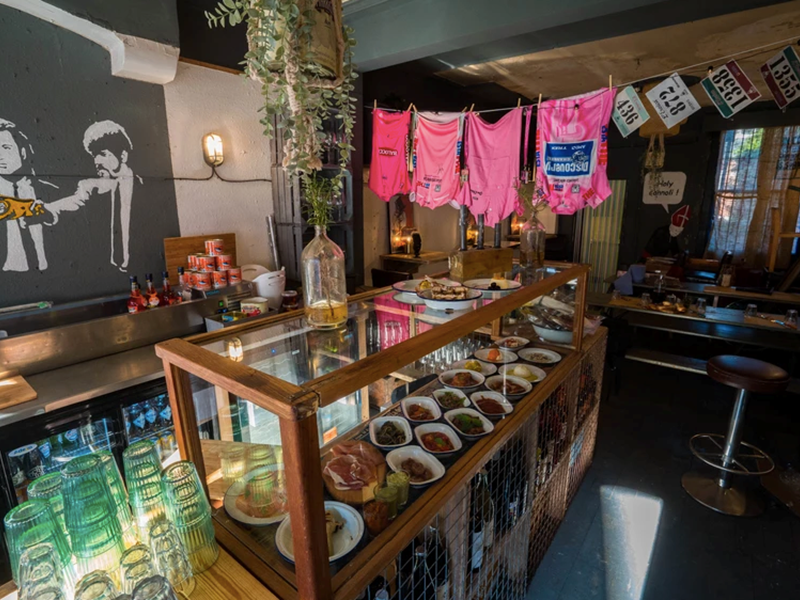 The counter at North Town, with a glass case filled with goods for sale.