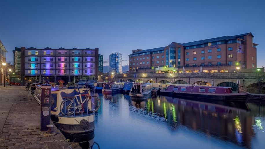 The exterior of the Best Western Quays Hotel shot at dusk.