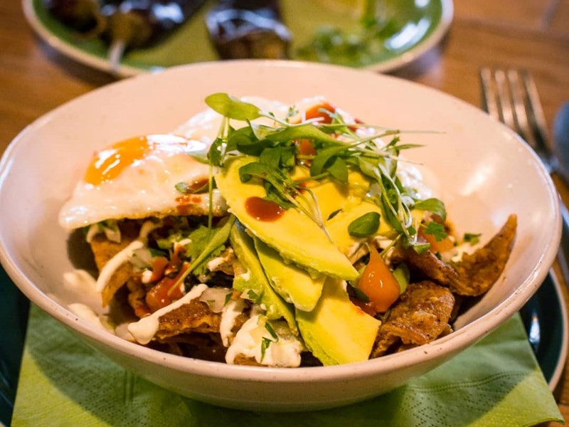 Food set out on a table at Kopi & Chai.