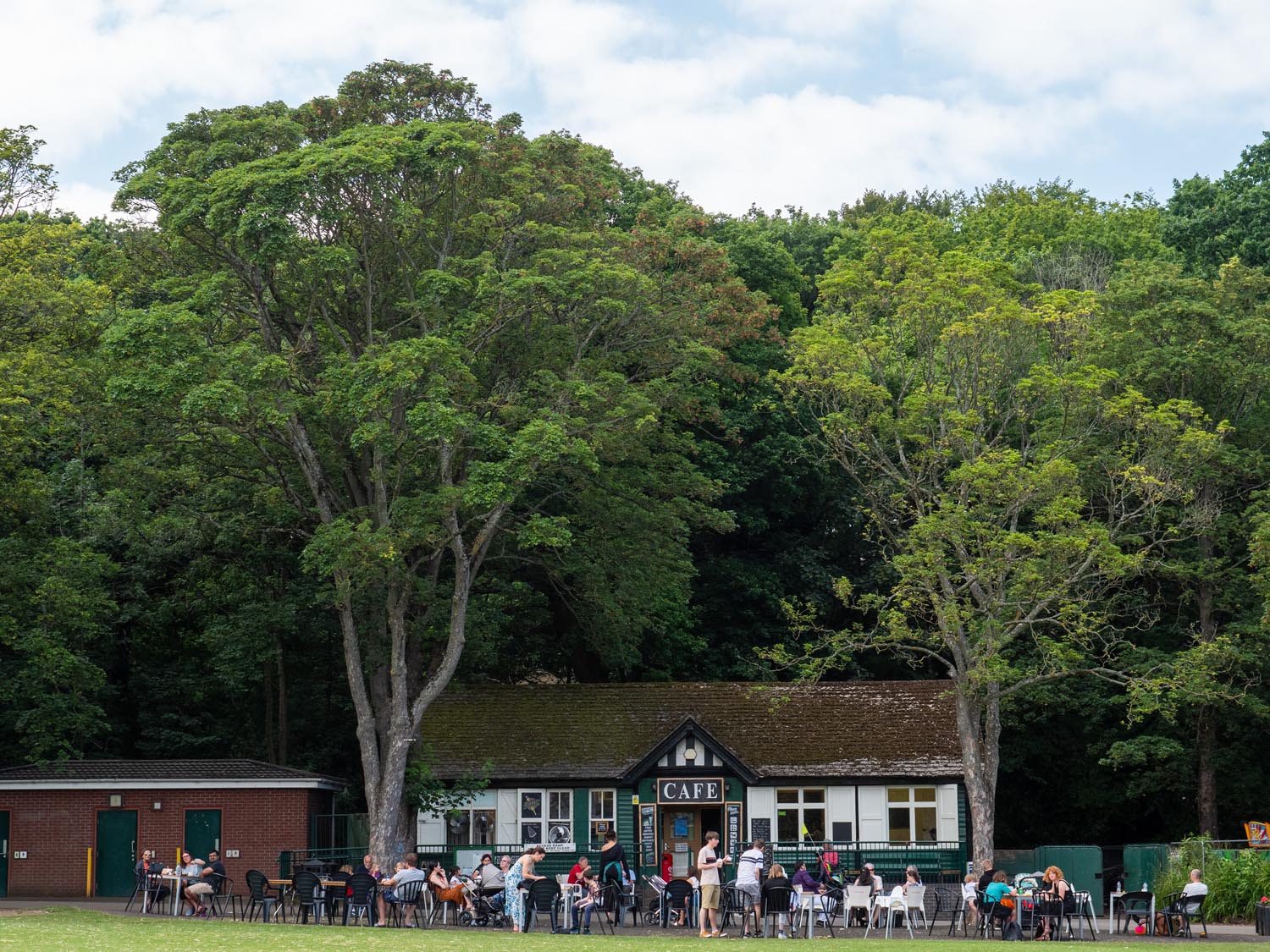 Endcliffe Park Cafe. In the distance is a busy cafe. 
