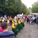 Morris dancers performing in front of crowds  at Nether Edge Market