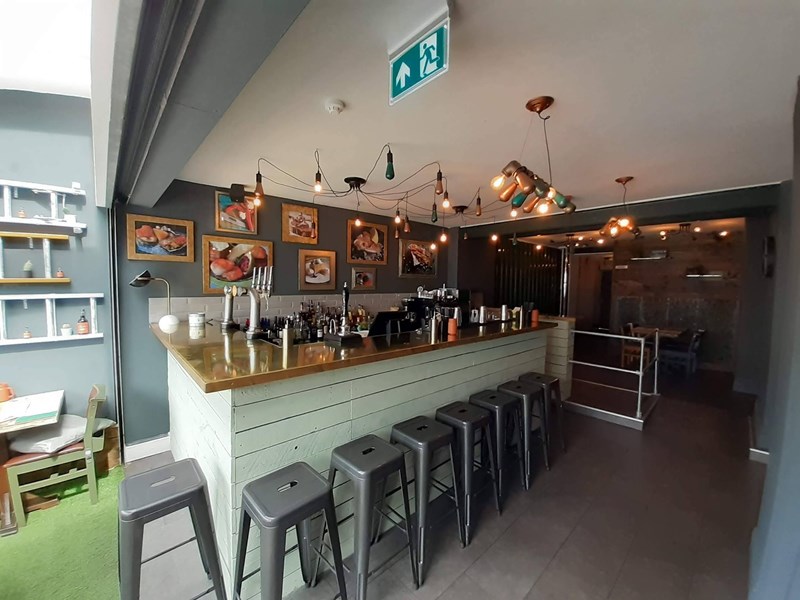 Stools round a bar at Butcher & Catch.