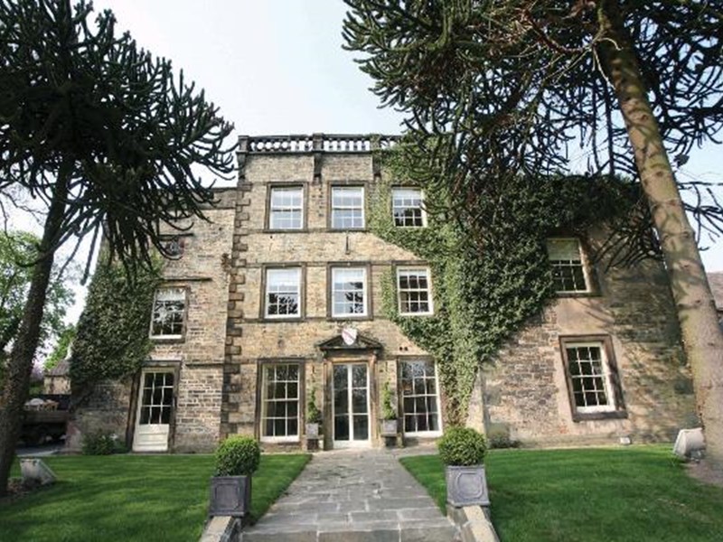 Best Western Plus Mosborough Hall Hotel surrounded by trees and gardens.