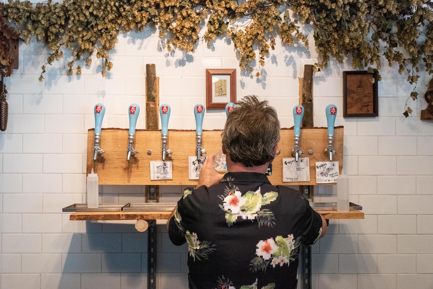 A man pulling a pint at The Brewery of St Mars of the Desert.